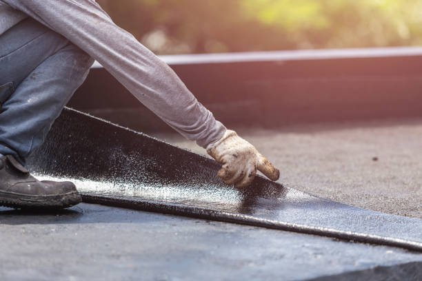 Professional Emergency Waterproofing technician working in Plymouth, WI
